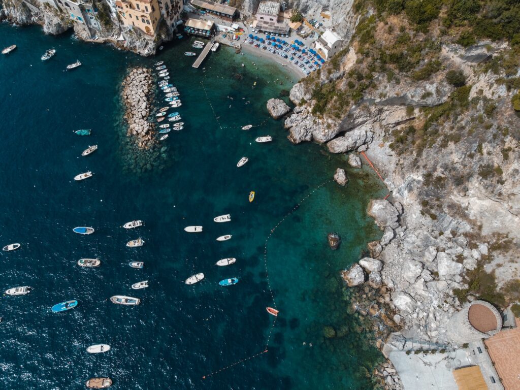 aerial view of boats on sea during daytime