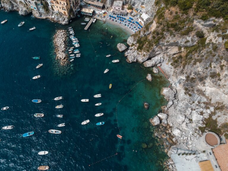 aerial view of boats on sea during daytime